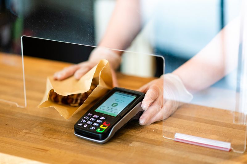 iStock-1245656523_Sneeze Guard_7 A credit card machine